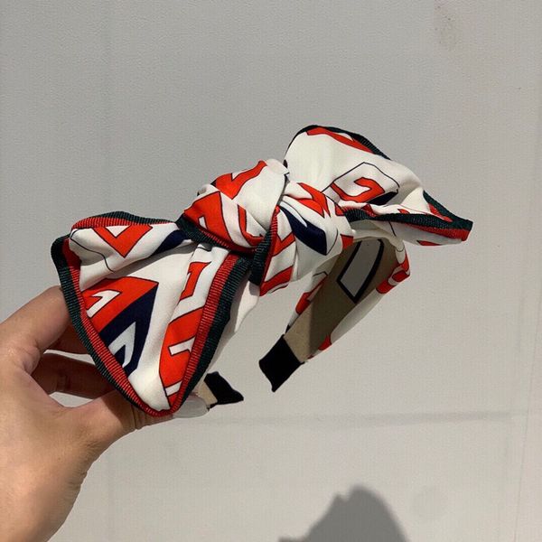 

2020 new hairband the special silk fabric of bow detail series is very textured, Golden;white