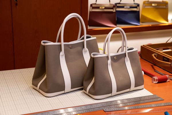 

wholesale fully hadmade grey,blue,yellow design garden party bag, size30cm,togo leather+canvas, also have size 36cm with different price