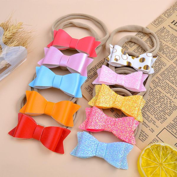

20pcs/lot solid colors glitter/pu bowknot with elastic hair band newborn baby headband headwear cute baby hair accessorie 319 q sqcmhj