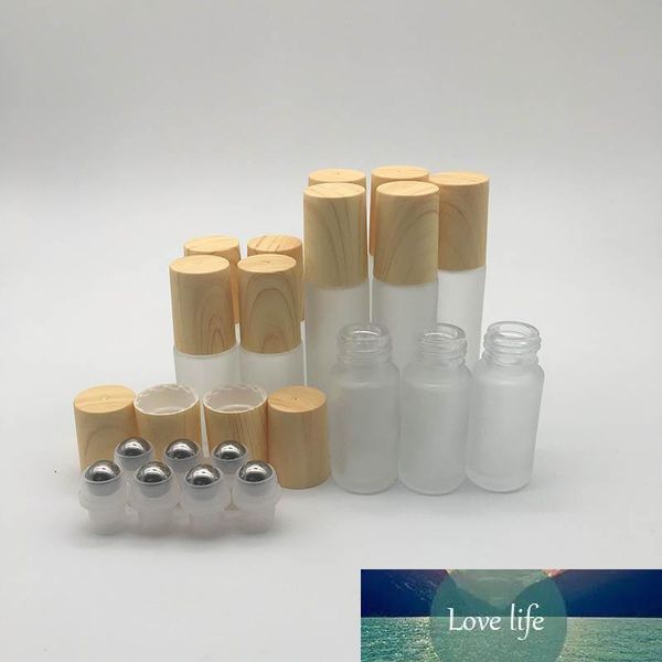 

frosted clear glass roller bottles vials containers with metal roller ball and wood grain plastic cap for essential oil perfume 5ml 10ml