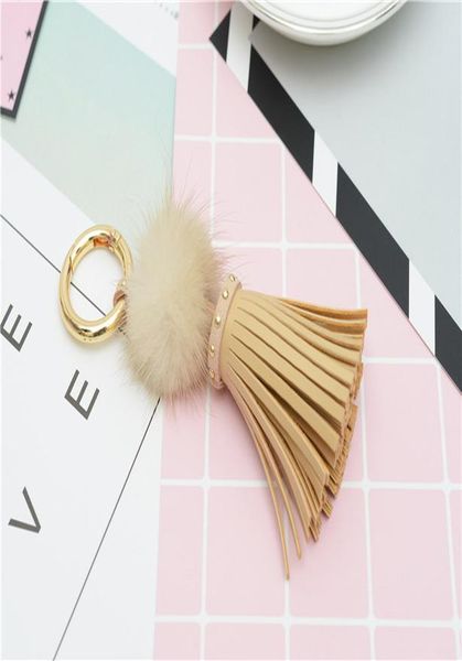 

реальная норка меховой мяч ключевая цепь с искусственными кожаными кисточками для женской сумки ключевой кольцо держатель ювелирных изделий