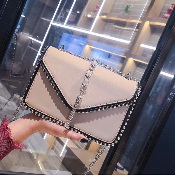 

2020 year crossbody bags fashion popular uxury rivet tassel chain shoulder bag solid color pu pearl tourism party shoulder bags
