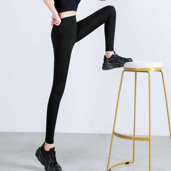 

shark skin leggings women's spring and autumn black yoga nine point liquid tight elastic thin barbie pants