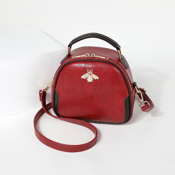 

women's 2020 new leisure fashion oil wax skin small round mini single shoulder cross arm portable peak women's bag honey leisure h
