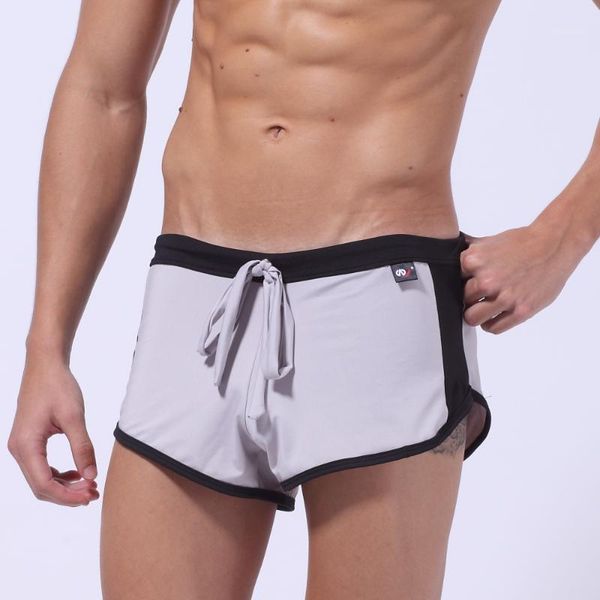 

2020 summer new quick dry men's beach casual style loose boxer shorts household slip men's board shorts male short polyester1, White;black