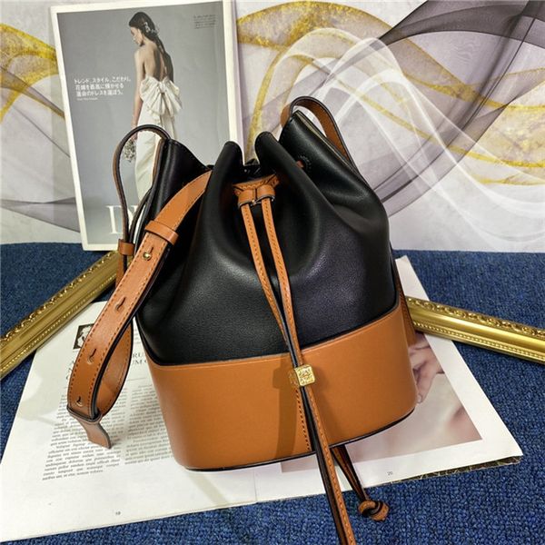 

sell new cowhide color matching bucket bag european and american fashion leather handbag mini shoulder bucket bag purses handbags