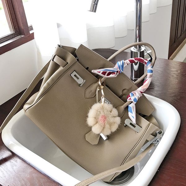 

togo head bag women's new star leather handbag