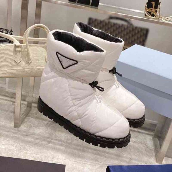 

designer boots womens booties the eiderdown comfort boot warm winter comes in water-repellent with down filling and can be worn outdoors as, Black