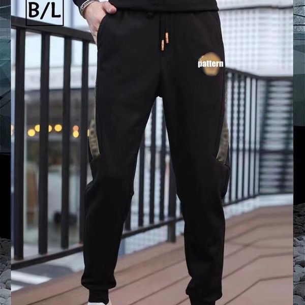 

2020 autumn and winter new european knitted casual pants men's embroidery bouquet feet men's sports pants plus velvet thickening, Black;blue