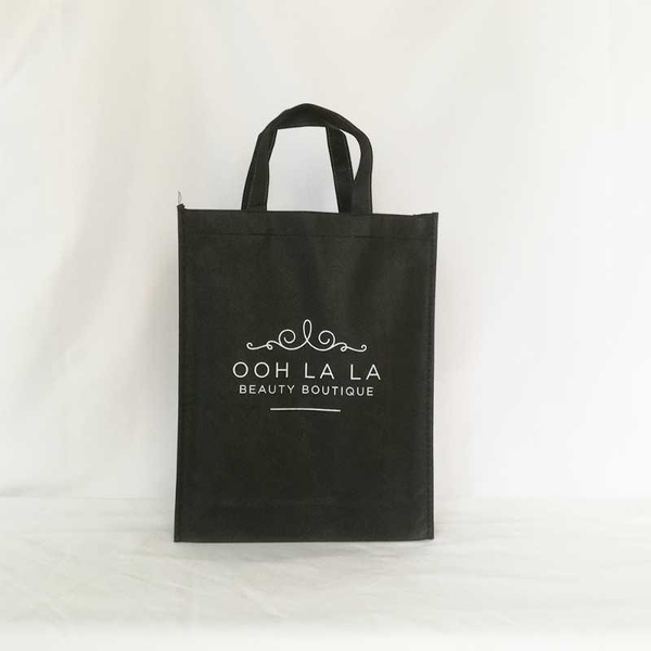 

wholesales 100pcs/lot custom logo printed reusable black non-woven tote gift bag with handle for shopping and party1