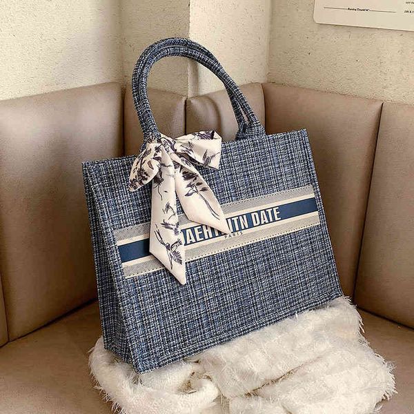 

2022 latest handbag factory store on women's character pattern korean version simple underarm high capacity tote