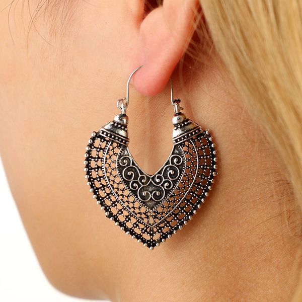 

heart shaped carved hollow alloy earrings, Silver