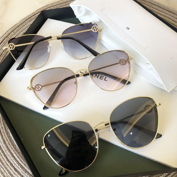 

2020 new cat's eye women's fashion small frame sunglasses punk wind glasses men's fenjia style, White;black