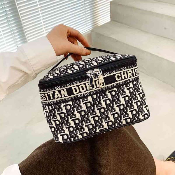 

2022 latest luggage factory wholesale bag small portable travel simple large capacity multifunctional square women's net red storage ba