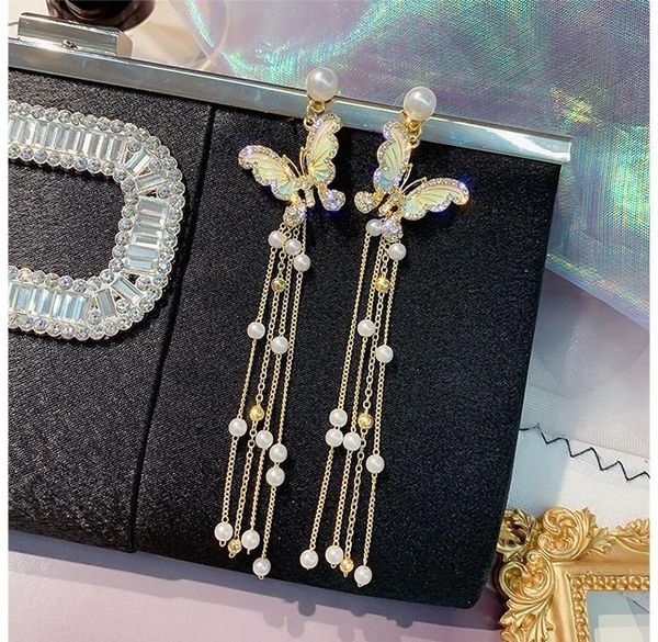 

long butterfly tassel earrings 2020 new a pair of earrings with two five pointed star pearl sweet and simple earrings for fashionable women, Golden