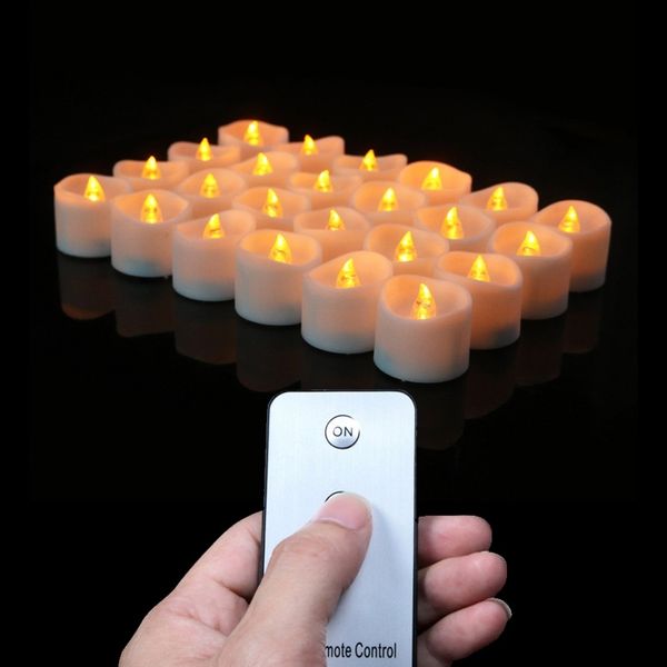 12pcs Flameless LED Tea Lights Bateria operada com controle remoto Realistic Flicking Velas Elétricas Y200531