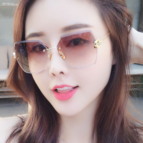 

new fashion and irregular frameless trimming sunglasses, White;black