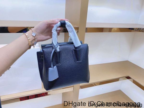 

brand women's handbag soft lychee grain cowhide on the head, fashionable and versatile, with size of 18cm * 17cm