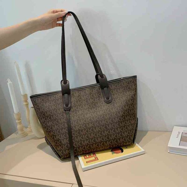 

2022 factory wholesale new net red texture spring summer high-capacity one shoulder tote bag women's fashion child mother handbag