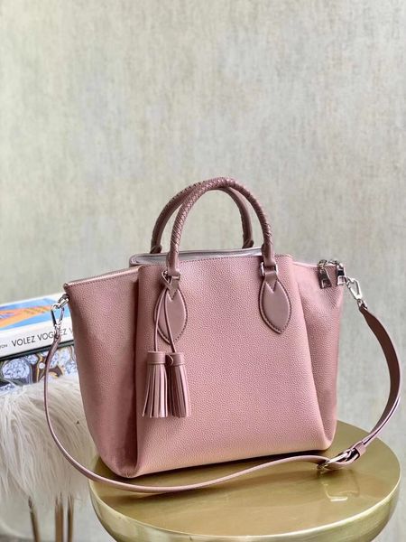 

m56906 pink haumea bag fashion perforation calf leather shoulder bag with twin leather tassels women handbag the leather braided handles