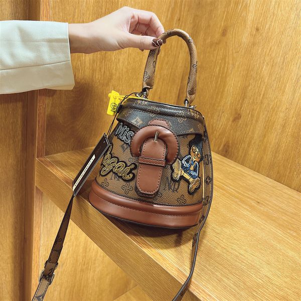 

ladies shoulder bags cute trend bear graffiti bucket bag street personality vertical leathers cylinder handbags elegant stereotypes printed