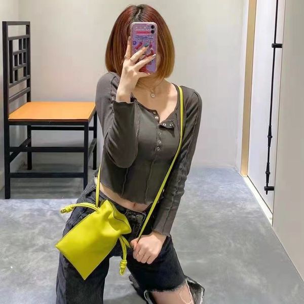 

women mobile phone bag drawstring design, can adjust the size , car key bags made of cowhide