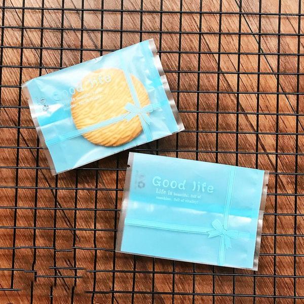 

100pcs/lot transparent flying butterfly goodie bags blue frosted roses border homemade snowflake crispy nougat wrapping paper1