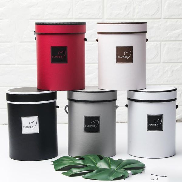 

4pcs round flower paper boxes lid hug flower bucket gift packaging box gift candy bar boxes party wedding supply explosion box1