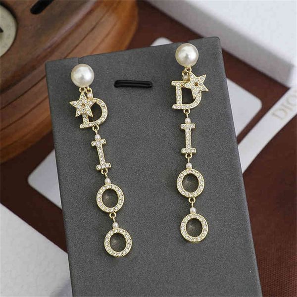 

87% off wholesale shop family pearl earrings women's new fengdijia tassel12, Golden