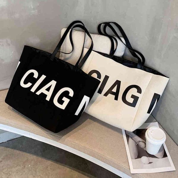 

new canvas lady's hand-held shopping bag fashion letter shoulder bag simple college student bag
