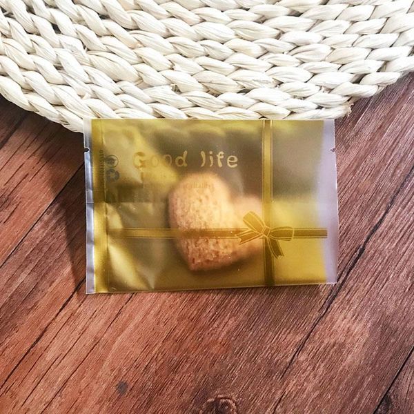 

gift wrap 100pcs/lot bow seal good life bakery biscuit candy snack packaging goodie bags gold frosted homemade snowflake crispy1