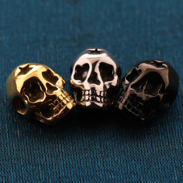 

handmade diy bracelet jewelry charm antique gold/silver/black stainless steel skull charms with hole, Bronze;silver