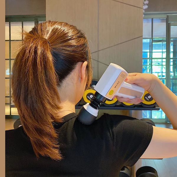

wholesale mini massage gun muscle-relaxing tool physiotherapy impact grab massage gun fitness muscle massage relaxing device