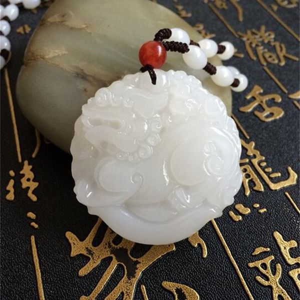 

a afghanistan white and jade pendant brave