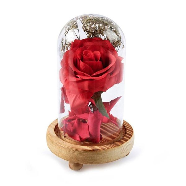 

gift wrap valentine's day beauty red romantic artificial rose fallen petals in a glass dome on wooden base wedding table decoration