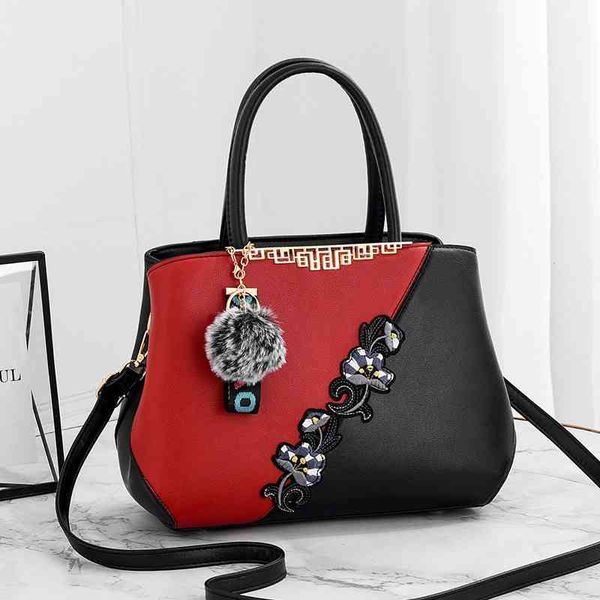 

bag 2021 new fashion women's big bag hand korean color contrast hair ball one shoulder slant span