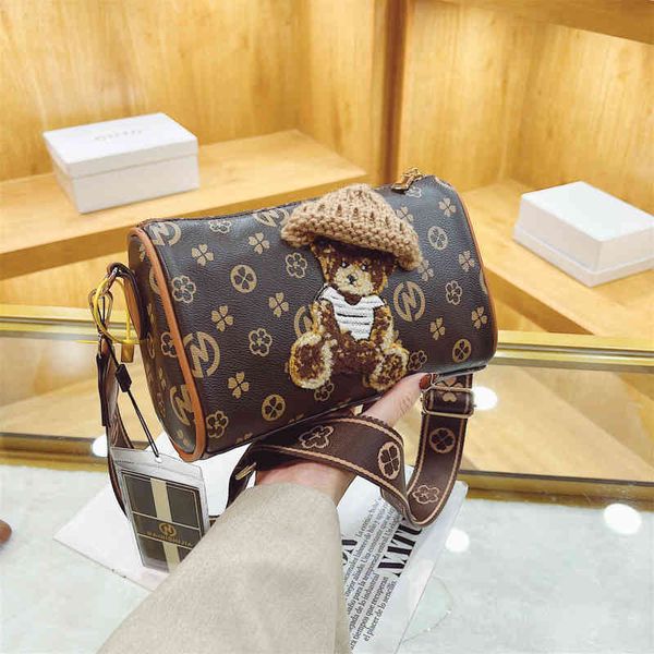 

2022 factory wholesale korean women's new embroidered hairy pillow cylinder bag trend printed single shoulder messenger bag