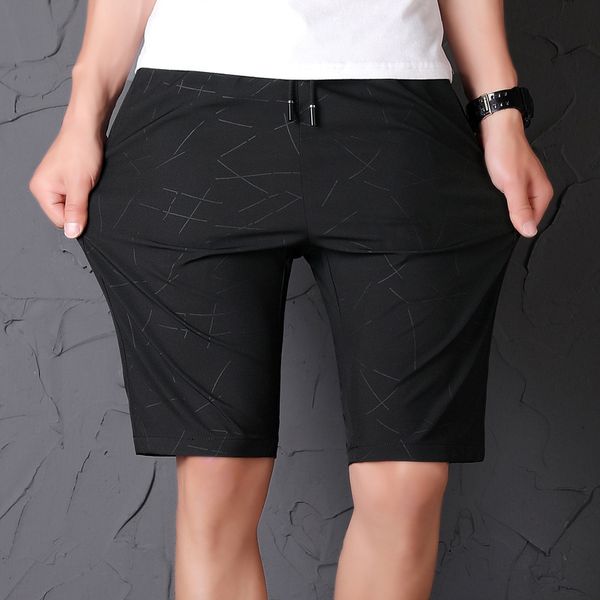 

sports quick drying 5-5 men's shorts korean casual summer beach pants big underpants thin tide, White;black