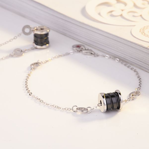 

s925 sterling silver classic black and white ceramic little red man bracelet