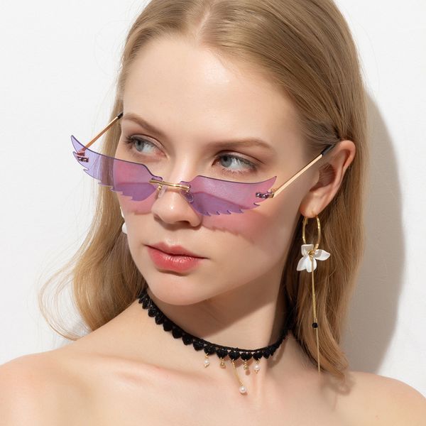 

new sunglasses women's fashion street flapping frameless wings sunglasses women's funny dance decoration sunglasses, White;black