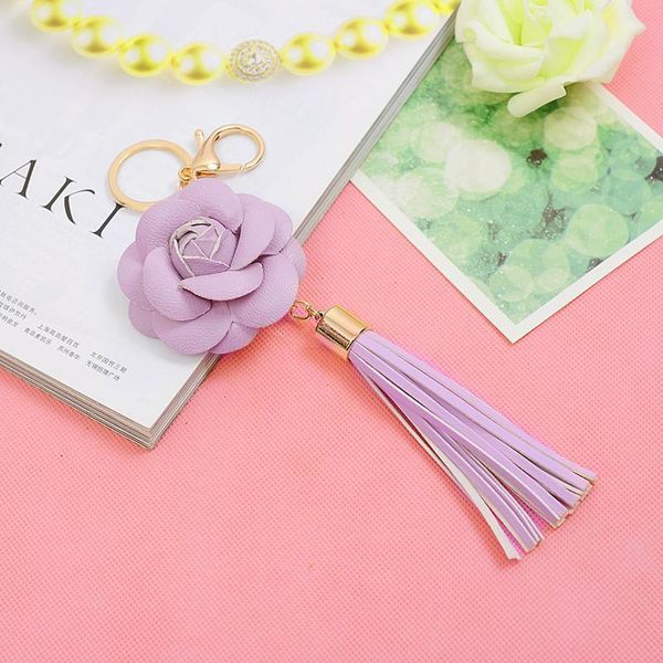 

1pcs faux leather flowers keychain tassel fringe pendant woman diy bag craft accessories tassels trim girl small gift ornament h jllnkf