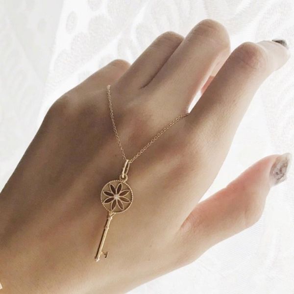 

925 sterling silver hollow lotus key necklace, classic european and american style necklace, high-quality jewelry gift