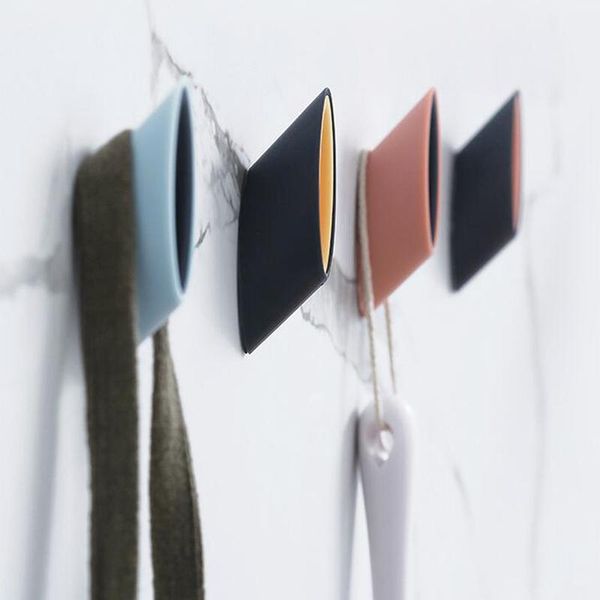 

4pcs/set towel hooks plastic door hangers self adhesive wall hangers hat racks keys hanger home decor1