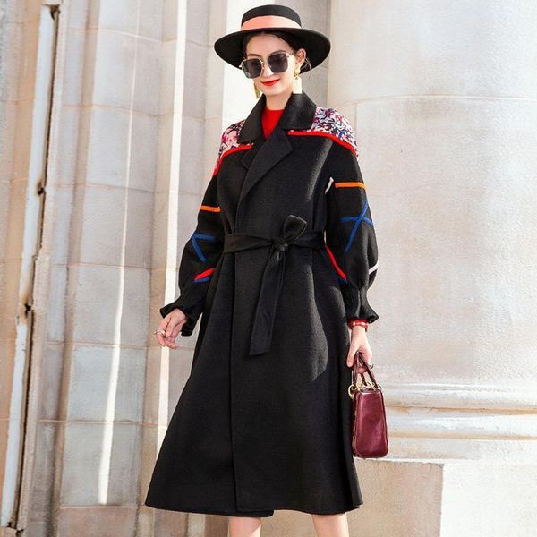 

2020 new winter coat women's temperament retro european and american loose wool temperament commuting black lapel coat1