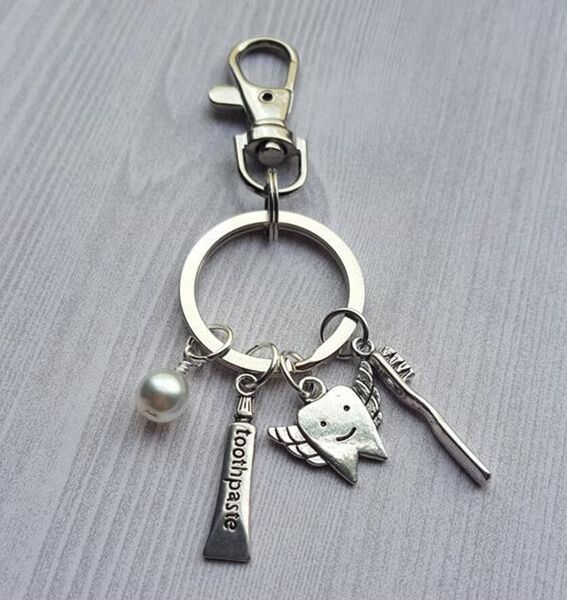 

teeth care for the tibetan dentist dental silver hygienist fairy toothpaste toothbrush charm pendant key chain ring car, Slivery;golden