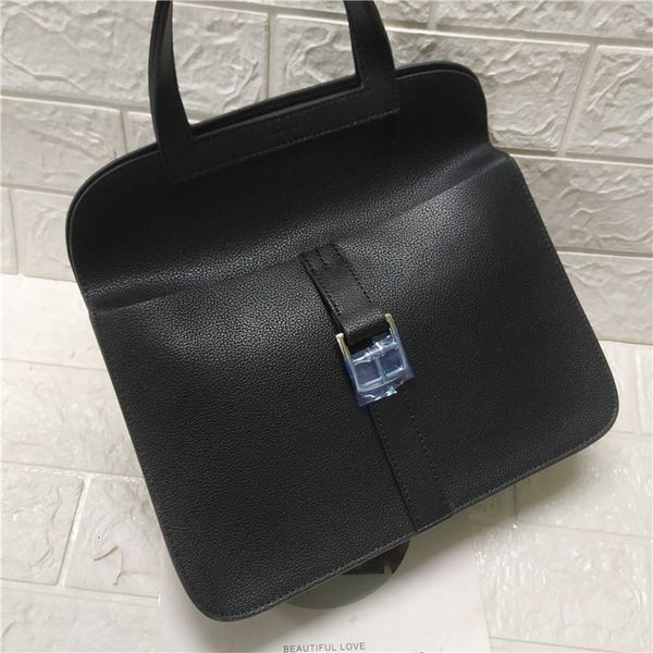 

postman's bag with one shoulder and horseshoe buckle