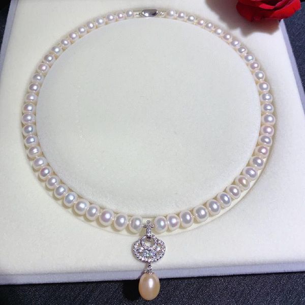 

natural freshwater white pearl necklace strong light and slight flaws 9mm natural color good upper body effect, Golden;silver