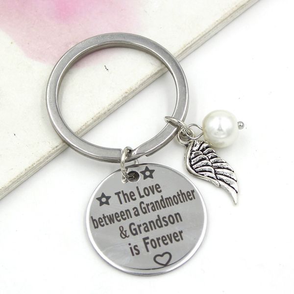 

grandma gift from grandson granddaughter grandmother keychain the love between a grandmother and granddaugther is forever, Slivery;golden