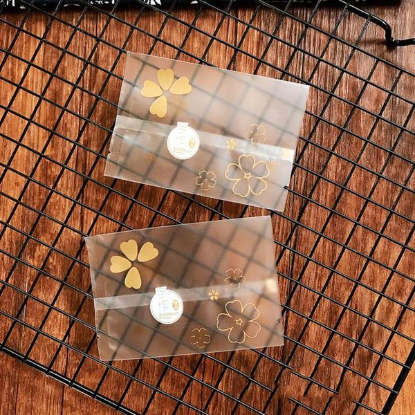 

gift wrap 100pcs/lot orange four leaf clover frosted line flowers transparent handmade snowflake crispy nougat wrapping party goodie bags1