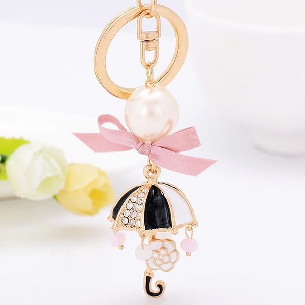 

pink enamel rhinestone umbrella key chain female bag ribbon small ornament pearls flower pendant car accessories charm keyring wmtmhi